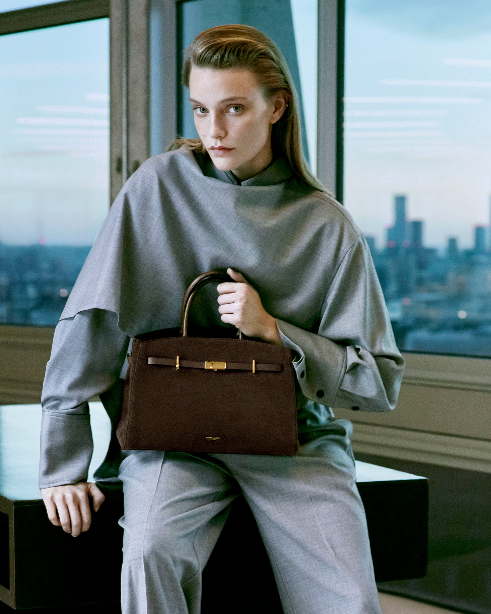 Model wearing a structured Pakito bag from the Spring Summer collection