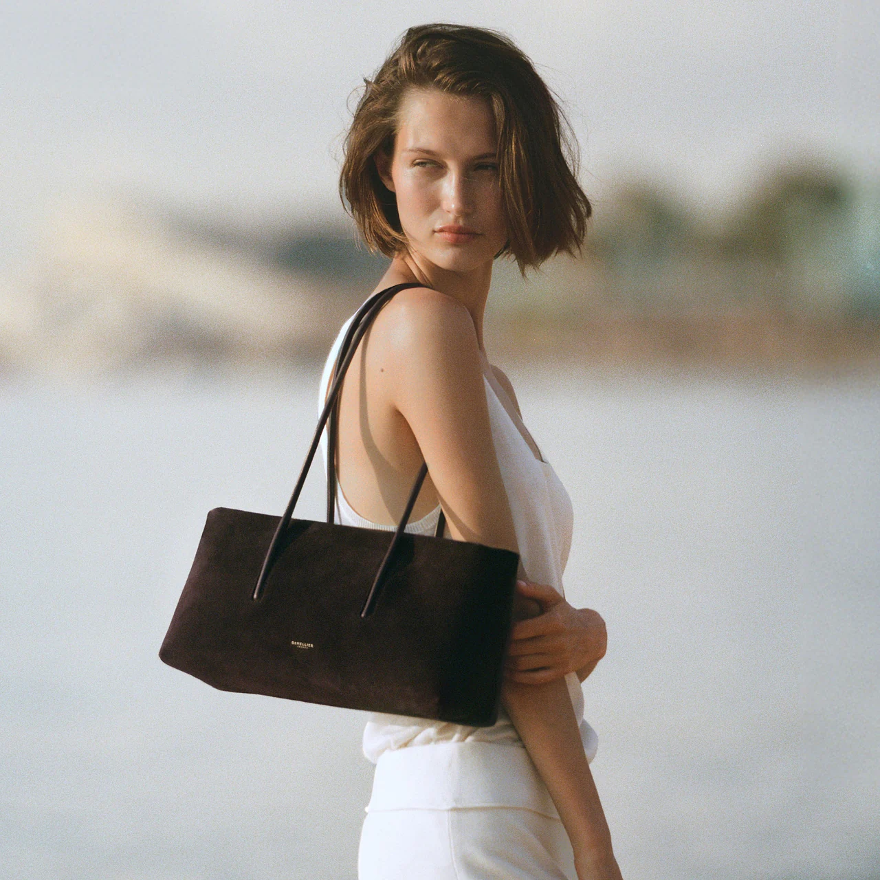Look 02 with a compact shoulder bag